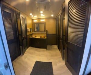 10Stall Darkwood Ladies room interior