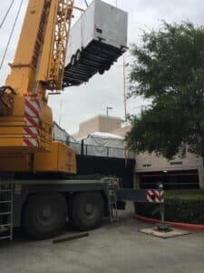 Craning VIP trailers into posisiton for the 2019 River Oaks Country Club Mens Clay Court Championship